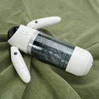 Robot Pro masturbateur automatique posé sur un tissu vert